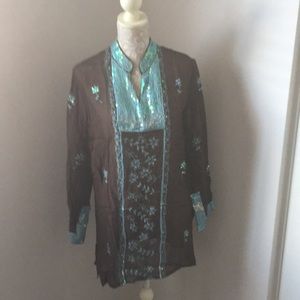 Brown and turquoise tunic top.